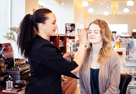 Makeup application and consultation at the LovelySkin retail store.
