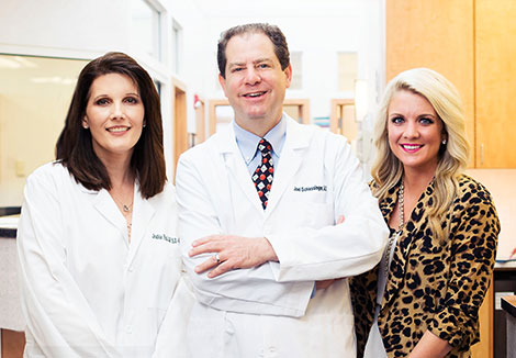 Dr. Schlessinger, MD and staff members at Skin Specialists P.C.