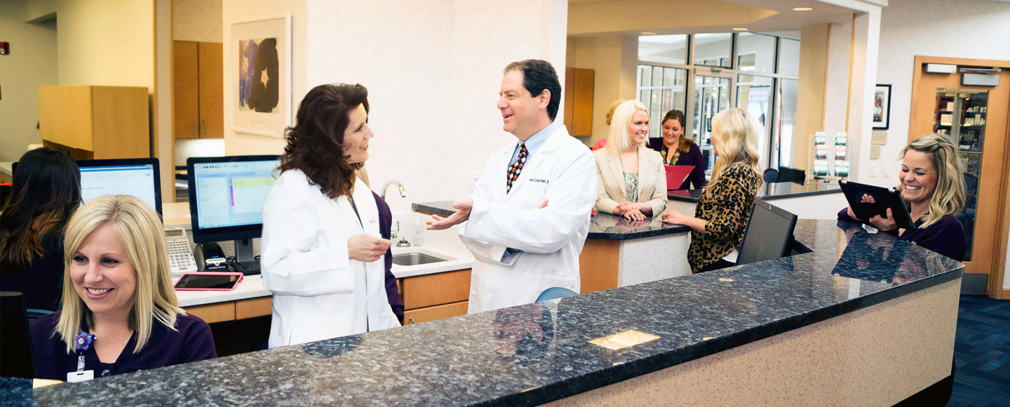 Doctor Schlessinger and his staff in the clinic.